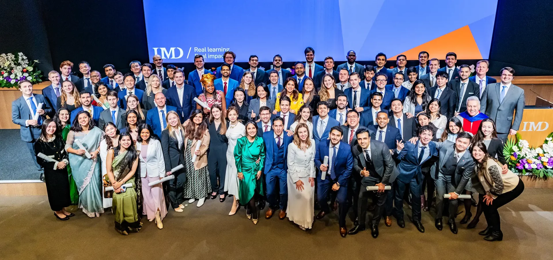 Class Of 2024 Over To You IMD MBA Blog   IMD MBA Grad Photos Class Of 2023 1920x904.webp